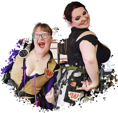two women smile and point to their red